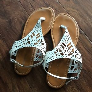 White stencil sandals
